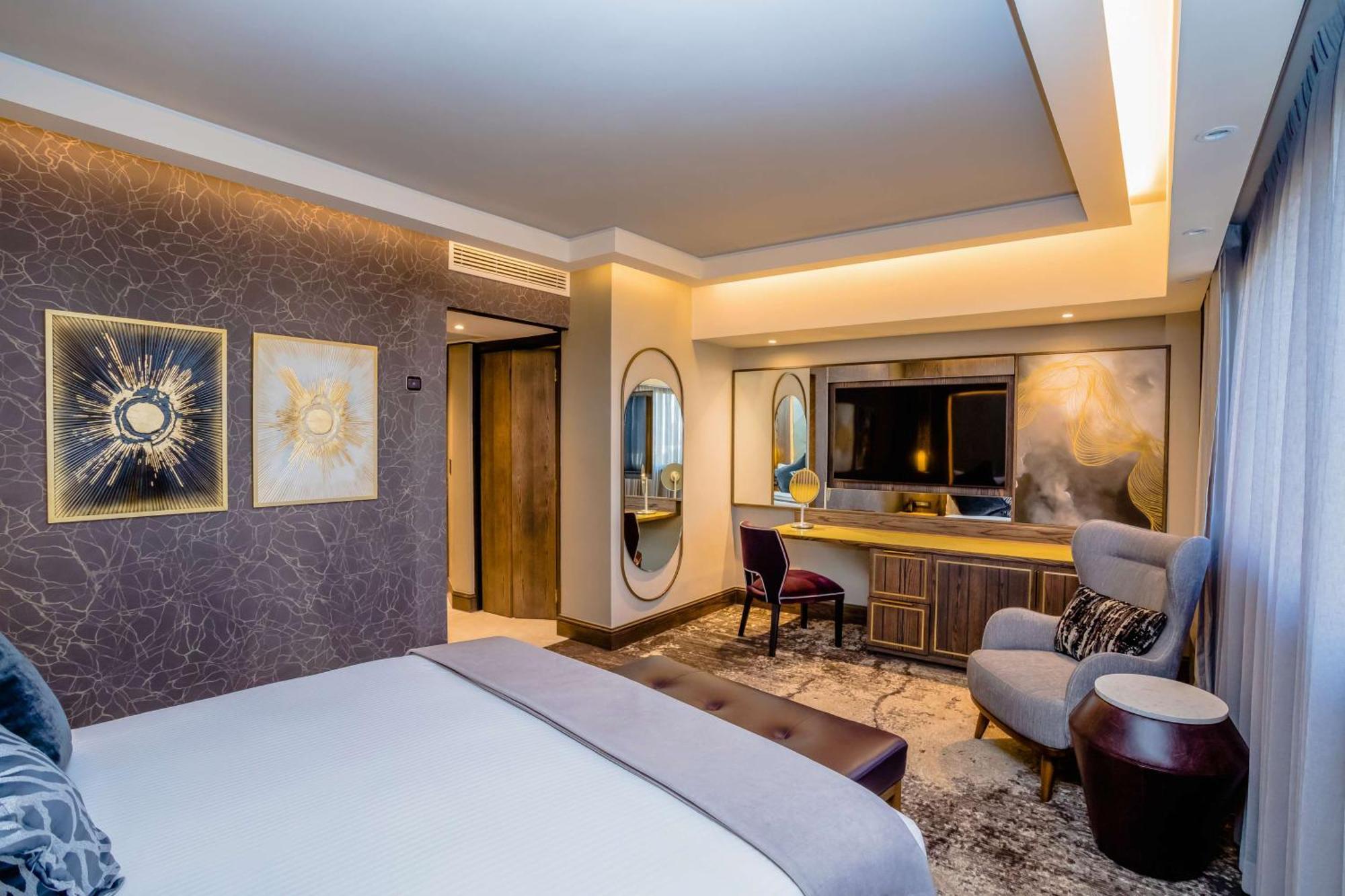 Sandton Sun And Towers Joanesburgo Exterior foto A bedroom at the hotel